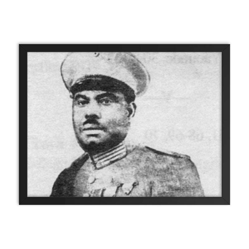 Charles Atangana framed print on a plain backdrop in size 18