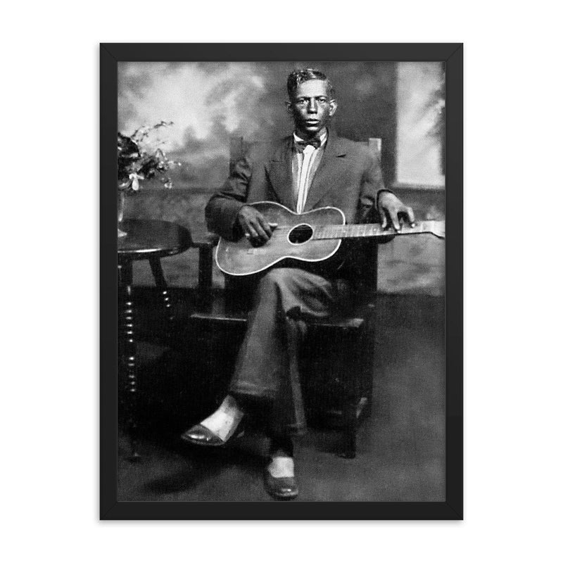 Charley Patton framed print on a plain backdrop in size 18