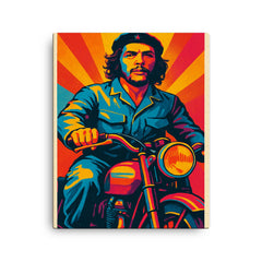 Che Guevara in bold pop art colors riding a classic motorcycle canvas print on a plain backdrop in size 16"x20".