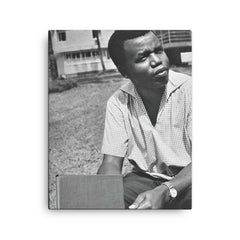 Chinua Achebe canvas print on a plain backdrop in size 16"x20".