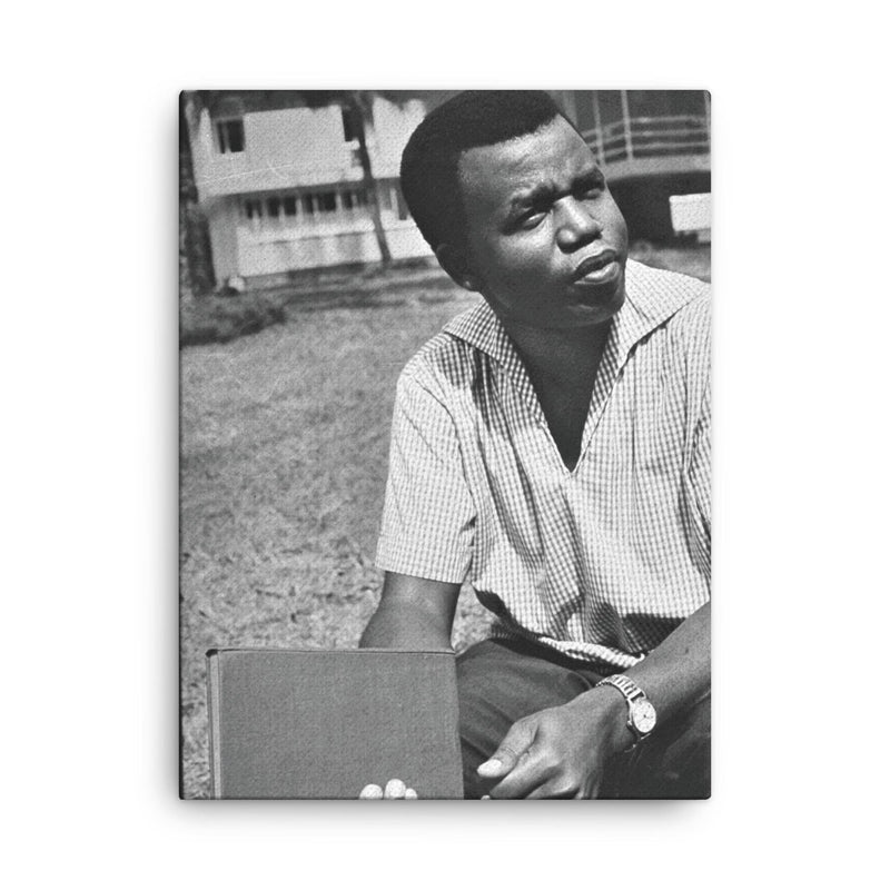 Chinua Achebe canvas print on a plain backdrop in size 18