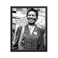 Claudia Jones framed print on a plain backdrop in size 16"x20".