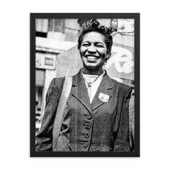 Claudia Jones framed print on a plain backdrop in size 18"x24".