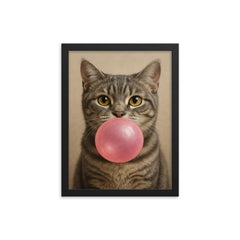 Cute gray tabby cat blowing pink bubblegum bubble framed print on a plain backdrop in size 12"x16".
