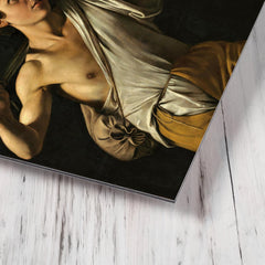David with the Head of Goliath by Caravaggio metal print mockup