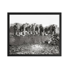 Destroying Bootleg Liquor - Prohibition Agents smashing bottles of seized bootleg whiskey and beer, 1923 framed print on a plain backdrop in size 16"x20".