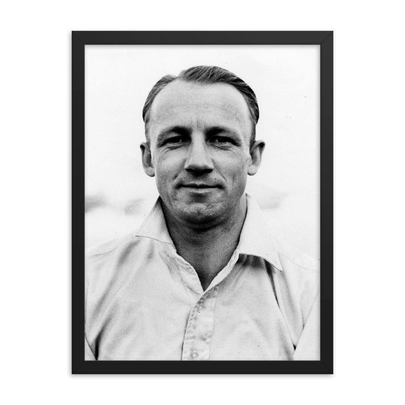 Donald Bradman framed print on a plain backdrop in size 18