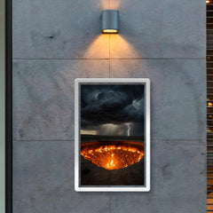 Door to Hell crater beneath storm clouds poster 2