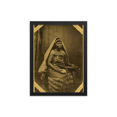 Efunroye Tinubu framed print on a plain backdrop in size 12"x16".