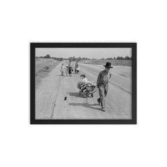 Family walking on highway by Dorothea Lange framed print on a plain backdrop in size 12"x16".