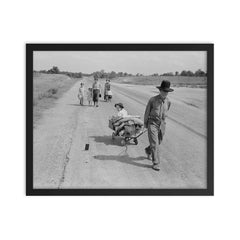 Family walking on highway by Dorothea Lange framed print on a plain backdrop in size 16"x20".
