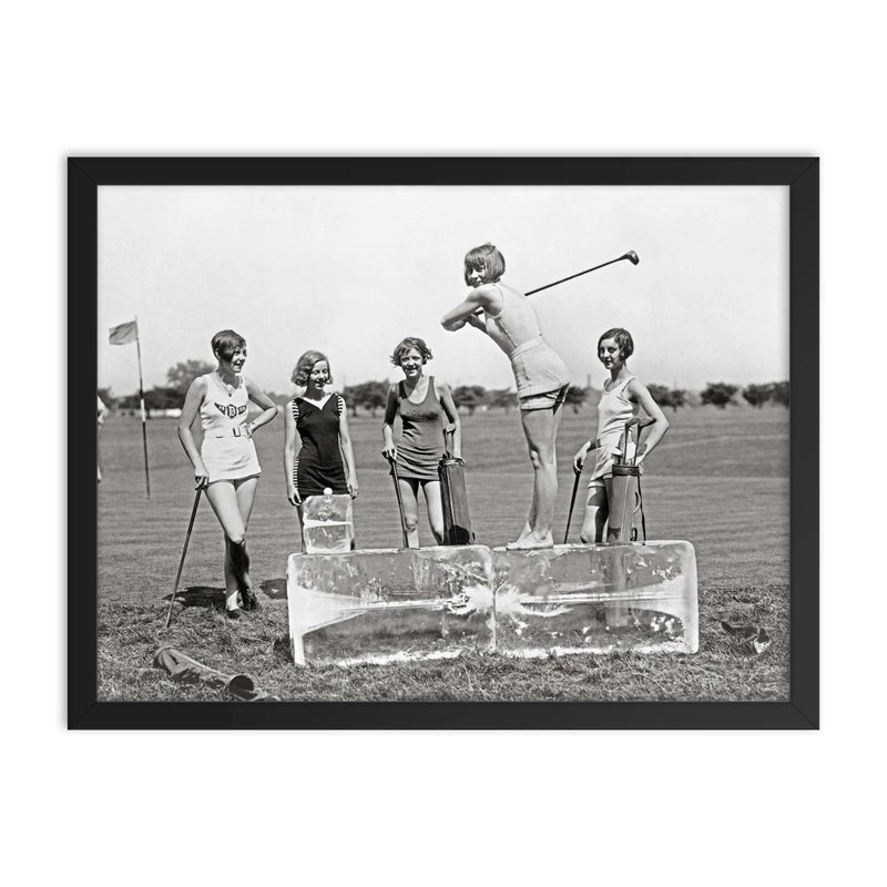 Flapper Girls Playing Golf, 1926 - A flapper girl tees off while standing on a giant block of ice, Washington, DC framed print on a plain backdrop in size 18