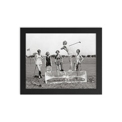 Flapper Girls Playing Golf, 1926 - A flapper girl tees off while standing on a giant block of ice, Washington, DC framed print on a plain backdrop in size 8"x10".