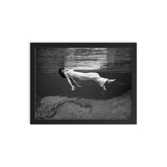 Floating Underwater - A woman floating below the surface of Weeki Wachee Springs, Florida, 1947 framed print on a plain backdrop in size 12"x16".