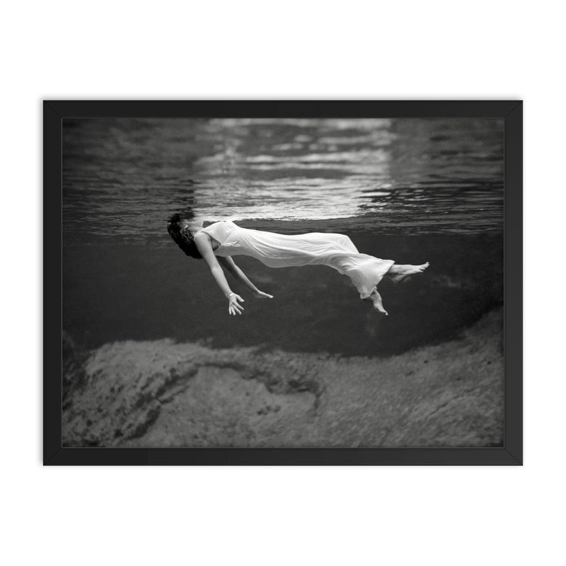 Floating Underwater - A woman floating below the surface of Weeki Wachee Springs, Florida, 1947 framed print on a plain backdrop in size 18