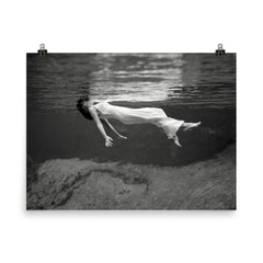Floating Underwater - A woman floating below the surface of Weeki Wachee Springs, Florida, 1947 poster on a plain backdrop in size 8"x10".