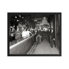 Gentlemen at the bar - a group of gentlemen drinking at a bar pose for a portrait, Dayton, Ohio, 1910 framed print on a plain backdrop in size 16"x20".