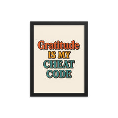 Gratitude is my cheat code framed print on a plain backdrop in size 12"x16".