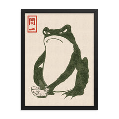 Grumpy Frog by Matsumoto Hoji framed print on a plain backdrop in size 18"x24".