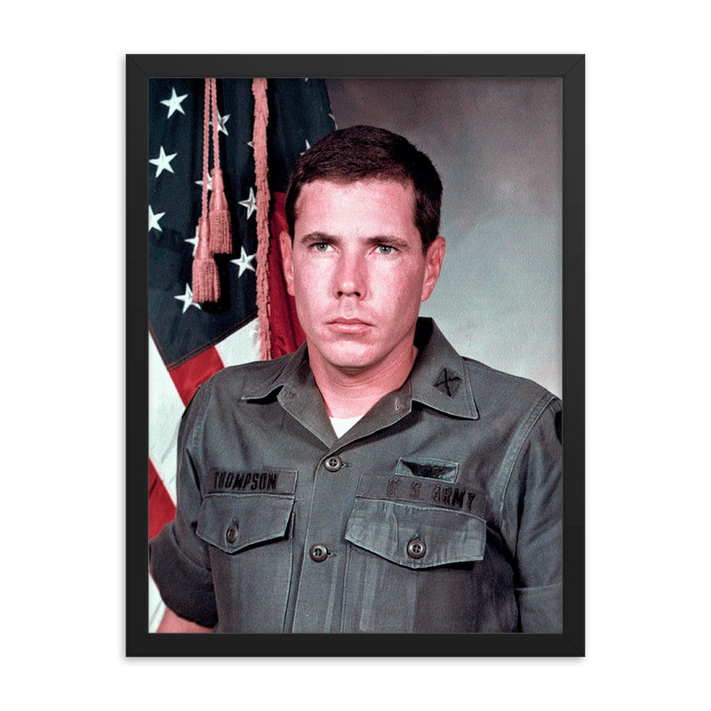 Hugh Thompson Jr. framed print on a plain backdrop in size 18