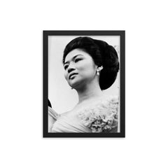 Imelda Marcos framed print on a plain backdrop in size 12"x16".