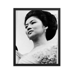 Imelda Marcos framed print on a plain backdrop in size 16"x20".