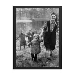 Jewish Prisoners Liberated from a Death Train, 1945 framed print on a plain backdrop in size 18"x24".
