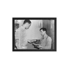 Joe Arridy Giving His Toy Train to a Fellow Inmate Before Death Row, 1939 framed print on a plain backdrop in size 12"x16".