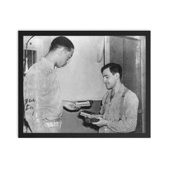 Joe Arridy Giving His Toy Train to a Fellow Inmate Before Death Row, 1939 framed print on a plain backdrop in size 16"x20".