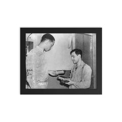 Joe Arridy Giving His Toy Train to a Fellow Inmate Before Death Row, 1939 framed print on a plain backdrop in size 8"x10".