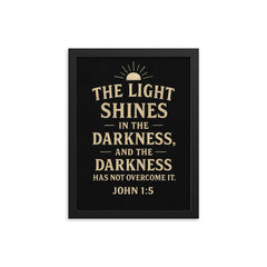 John 15 The light shines in the darkness and the darkness has not overcome it framed print on a plain backdrop in size 12"x16".