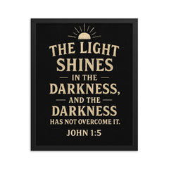John 15 The light shines in the darkness and the darkness has not overcome it framed print on a plain backdrop in size 16"x20".