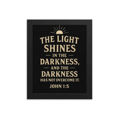 John 15 The light shines in the darkness and the darkness has not overcome it framed print on a plain backdrop in size 8"x10".