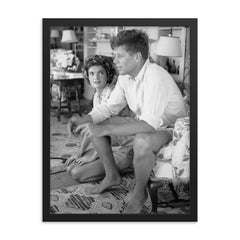 John F Kennedy with Jackie Bouvier framed print on a plain backdrop in size 18"x24".