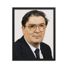 John Hume framed print on a plain backdrop in size 16"x20".