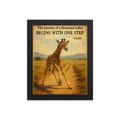 Journey of a thousand miles quote baby giraffe taking first step framed print on a plain backdrop in size 8"x10".