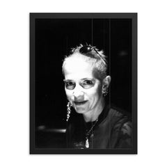 Kathy Acker framed print on a plain backdrop in size 18"x24".