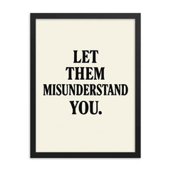 Let them misunderstand you framed print on a plain backdrop in size 18"x24".