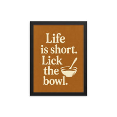 Life is short Lick the bowl  framed print on a plain backdrop in size 12"x16".