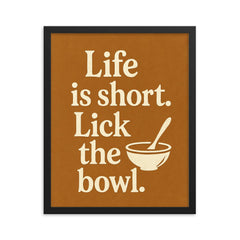 Life is short Lick the bowl  framed print on a plain backdrop in size 16"x20".