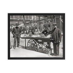 Little Italy food cart - young men selling food from a cart in Little Italy, New York City, 1908 framed print on a plain backdrop in size 16"x20".