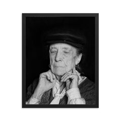 Louise Bourgeois framed print on a plain backdrop in size 16"x20".