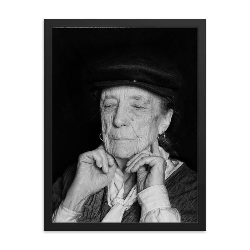 Louise Bourgeois framed print on a plain backdrop in size 18