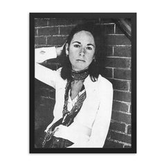 Louise Gluck framed print on a plain backdrop in size 18"x24".