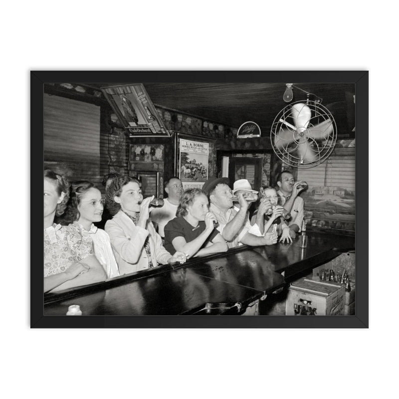 Louisiana Bar, 1938 - vintage photograph of a group of patrons enjoying a drink at a bar in Louisiana framed print on a plain backdrop in size 18