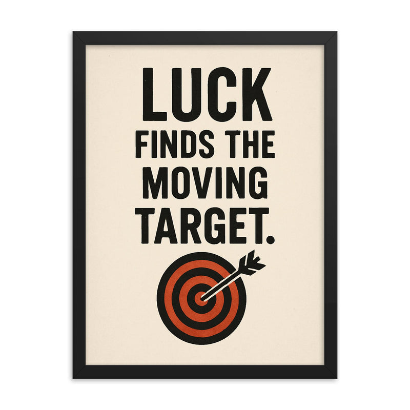 Luck finds the moving target framed print on a plain backdrop in size 18