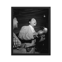Machito framed print on a plain backdrop in size 16"x20".