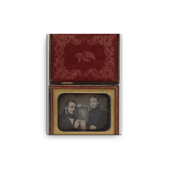 Man and Woman Posing with Family Daguerreotype, c. 1850 canvas print on a plain backdrop in size 12"x16".