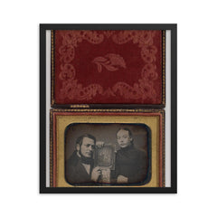 Man and Woman Posing with Family Daguerreotype, c. 1850 framed print on a plain backdrop in size 16"x20".