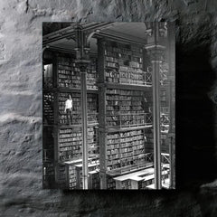 Man Browsing for Books in the Old Public Library of Cincinnati metal print mockup